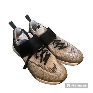 White and black Nike Zoom athletic shoes